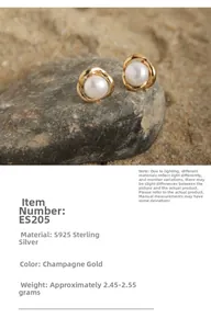 Macro view of S925 sterling silver champagne gold pearl flower earrings on dark rock
