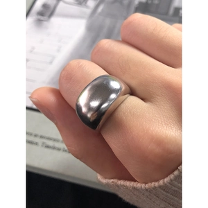Polished S925 sterling silver wide dome ring for women with a minimalist aesthetic style