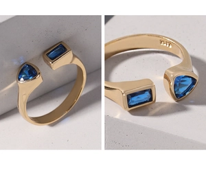 Detail view of gold-plated S925 silver ring featuring blue geometric zircon stones