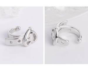 Macro view of S925 sterling silver ear cuff showing the heart belt buckle design and stamp