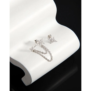 Asymmetric S925 sterling silver star earrings with delicate chains and cubic zirconia