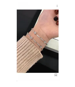 Macro detail of S925 sterling silver star bracelets with sparkling pavé cubic zirconia