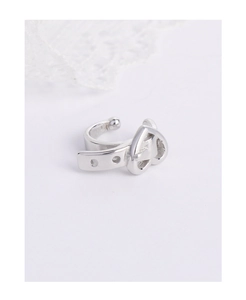 Detailed view of silver S925 belt buckle earring cuff with polished metallic texture