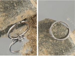 Detailed macro view of S925 sterling silver cross ring on natural stone background