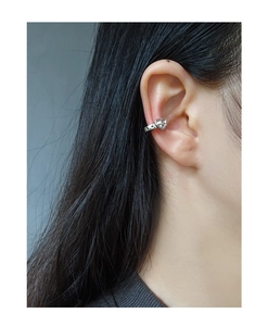 S925 sterling silver heart-shaped ear cuff shown on a model without ear piercing
