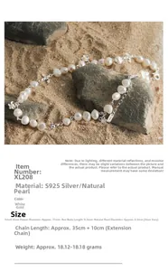 Detailed close-up of S925 silver bee and flower charms on a natural pearl necklace