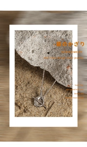 Detailed close-up of S925 sterling silver bead chain with unique OT toggle clasp and pendant