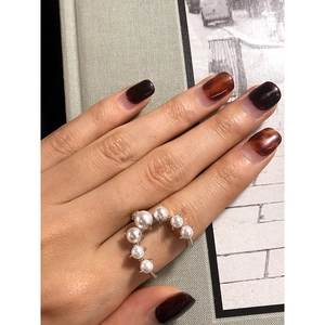 Elegant S925 sterling silver U-shaped ring with seven varying sized pearls for women