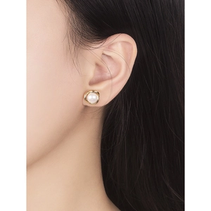 Minimalist S925 sterling silver flower pearl stud earrings worn by female model