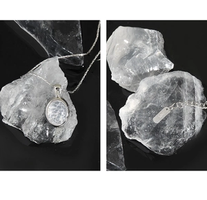 Detail of S925 sterling silver stamp on the clasp of an oval moonstone necklace