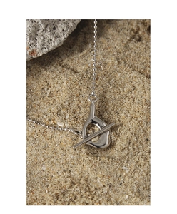 Detailed macro of S925 silver toggle clasp necklace with organic molten lava art clasp