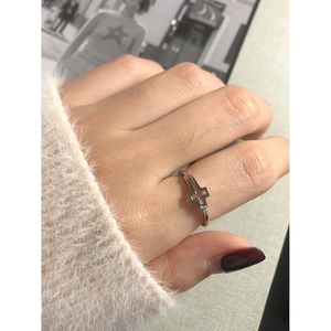 Minimalist S925 sterling silver ring featuring a clean hollow cross design on a finger