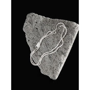 Sparkling S925 sterling silver beaded necklace on volcanic rock with adjustable chain