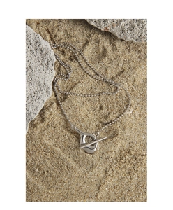 Detail shot of a S925 sterling silver bead chain necklace with a modern OT toggle clasp