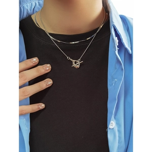 Double-layered S925 silver necklace with bead chain and snake chain featuring a toggle clasp