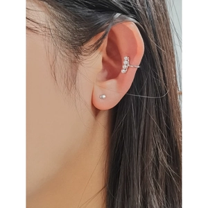 Elegant S925 sterling silver ear cuff featuring four white pearls in a minimalist row