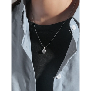 Elegant S925 sterling silver necklace featuring a translucent oval moonstone pendant
