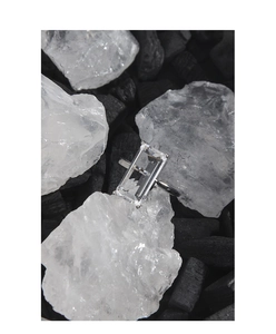 Macro shot of minimalist S925 silver ring featuring a large rectangular zircon stone