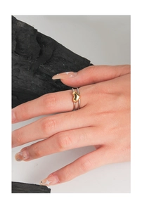 Detailed view of dual-layered S925 silver ring featuring a textured golden heart on finger