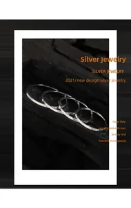 Detailed view of 1mm S925 sterling silver rings with textured vertical patterns
