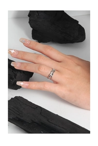 Close-up of S925 sterling silver open ring with irregular lava texture and micro-inlaid zircon