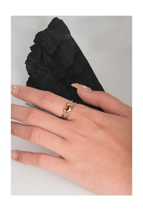 Detail view of a double-layered S925 silver ring featuring a 3D gold heart accent