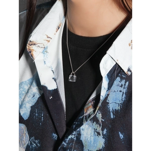 Minimalist S925 sterling silver padlock necklace with clear zircon shown on a model