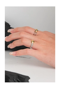 Detailed close-up of double-layer S925 silver ring with golden heart element and textures