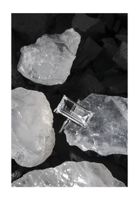 Detail of emerald cut rectangle zircon set on S925 silver band with creative backdrop