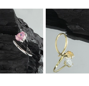 Detailed close-up of S925 sterling silver stamp on pear-cut zircon stone rings