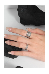 Detailed view of S925 silver lava texture rings with micro-inlaid zircon and red stone