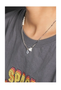 Detail of S925 silver necklace featuring pearls, a silver heart, and a crystal drop