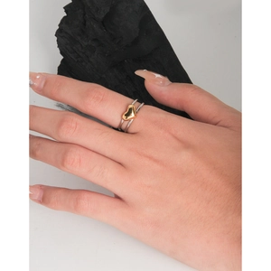 Minimalist S925 sterling silver double-layered ring with a gold heart pendant on model