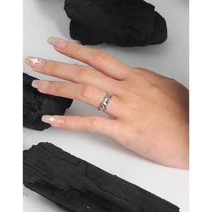 Irregular textured S925 sterling silver ring with micro-set zircon on model hand