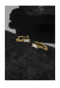 Macro view of S925 sterling silver chain stud earrings with rectangular cubic zirconia