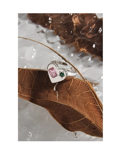 Detailed shot of S925 sterling silver ring featuring pink stone and star detail