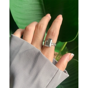 Unique S925 silver irregular liquid chain ring with chocolate-bite design on finger