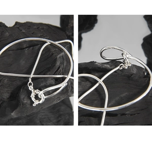 Detail view of double-layer S925 sterling silver snake chain with clasp and hallmark