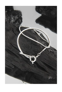 Close-up of minimalist S925 sterling silver double layer snake chain bracelet with clasp