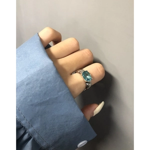 Minimalist S925 sterling silver ring featuring a sparkling oval blue zircon stone