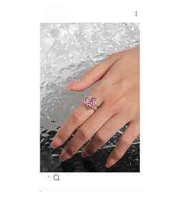 Close-up of S925 silver ring featuring a pink heart-shaped zircon and double-layer band
