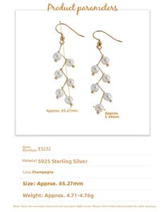 Detail view of gold branch-style pearl earrings showing length 65.27mm and pearl diameter