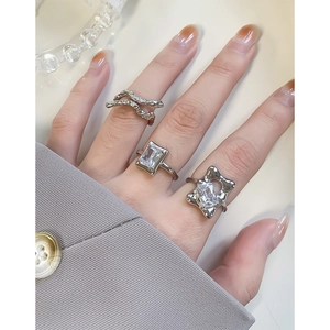 S925 sterling silver rings set with zircon stones shown on hand with elegant styling