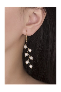 Detail of S925 silver pearl drop earrings featuring six white pearls on a golden vine frame