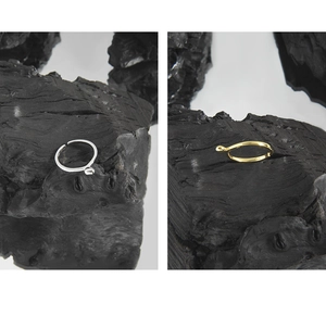 Detail of adjustable S925 sterling silver ball rings in gold and silver finishes