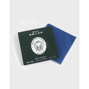 Premium silver polishing cloth with jagged edges and a dark green protective sleeve cover