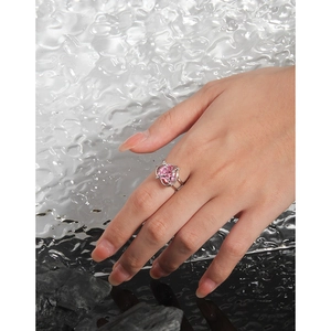 Minimalist S925 silver ring featuring a pink heart zirconia in a claw setting on hand