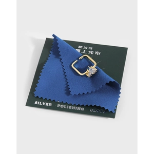 Square gold geometric ring with triangle zircon and silver polishing cloth