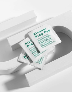 Macro view of individually wrapped alcohol pads for jewelry cleaning and sterilization