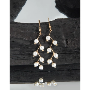 Elegant S925 sterling silver long fringe earrings with pearl vine design on black background